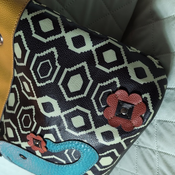 Relic Faux Leather Satchel and Wallet with Elephant/Floral Design. - Picture 4 of 16